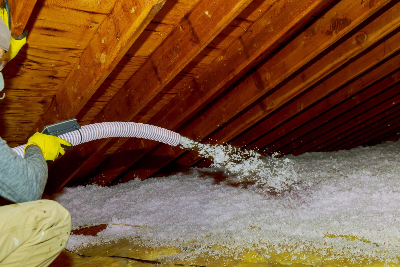 Blow-in attic insulation installed across an attic floor